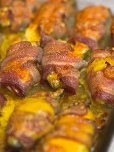 Bacon-wrapped jalapeño poppers hot off the smoker